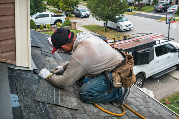 Professional Storm Damage Roof Repair technician working in Belleville, PA